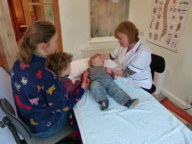 Caroline treating a child