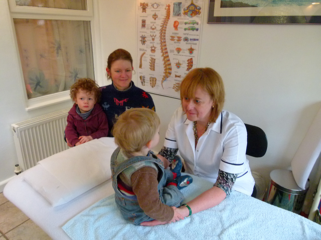 Caroline treating a patient